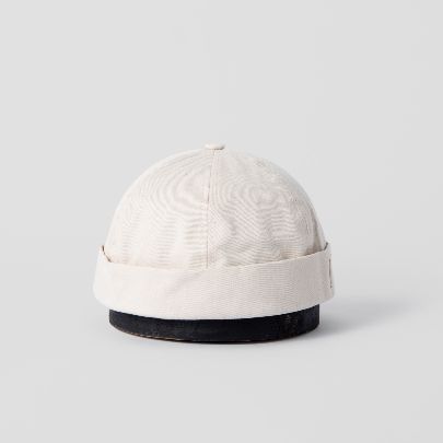 Picture of cream Docker hat 