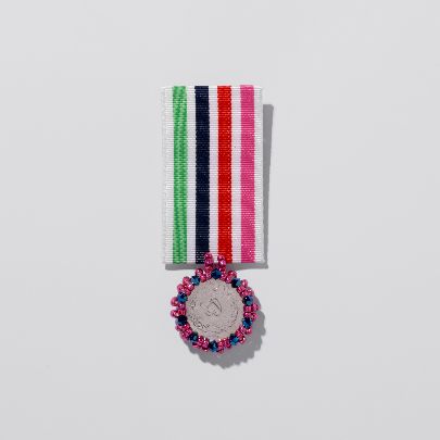 Picture of 5 riyal pink coin Swarovski medal