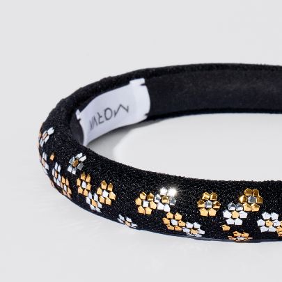 Picture of Black headpiece with golden khouse blossoms