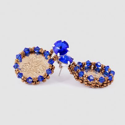 Picture of blue earrings with coin