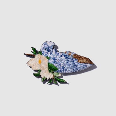 Picture of White and blue parrot brooch