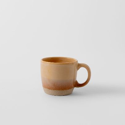 Picture of Pottery mug with orange handle