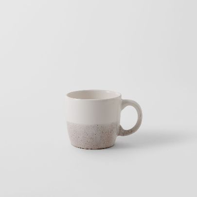 Picture of A white ceramic mug with a handle