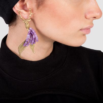 Picture of goose earrings with purple stone