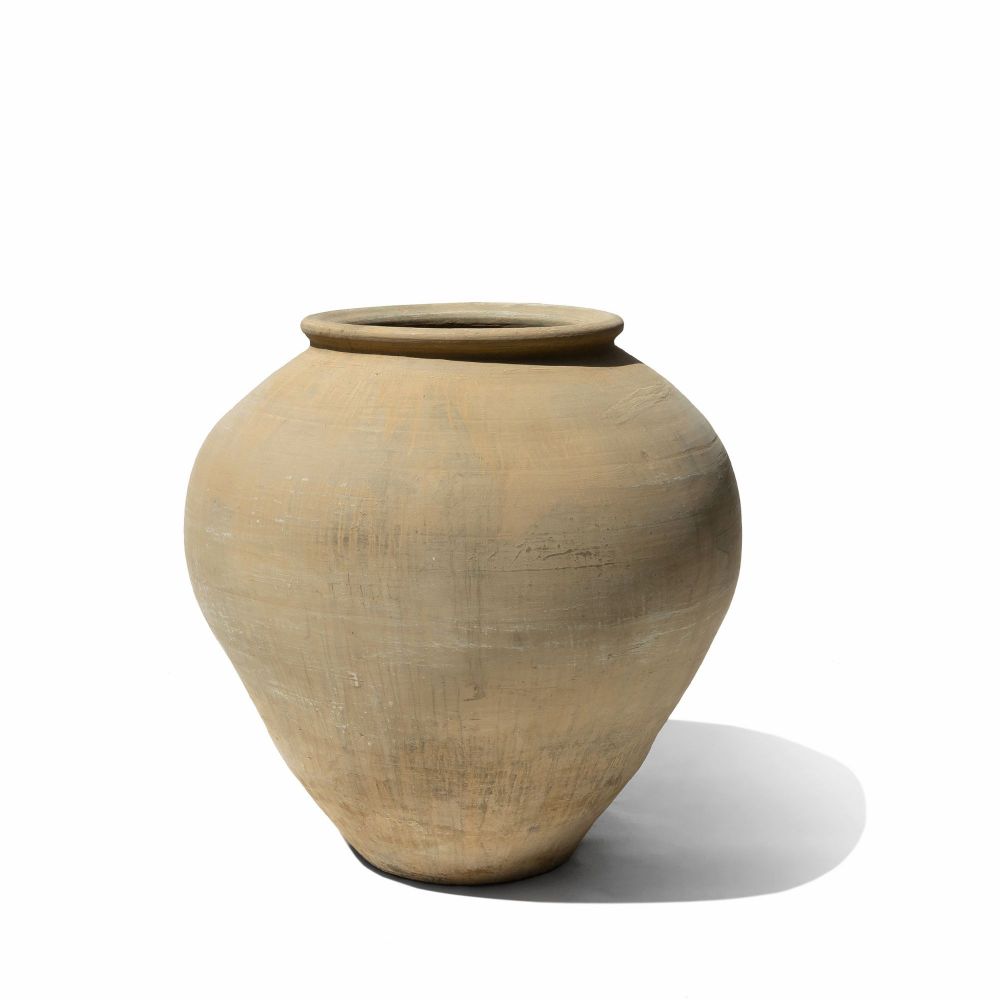 Picture of Cylindrical terracotta jar with golden cream patina