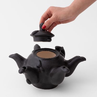 Picture of Black six-hose teapot statue