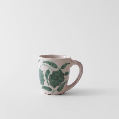 Picture of Glazed mug and green clove clay