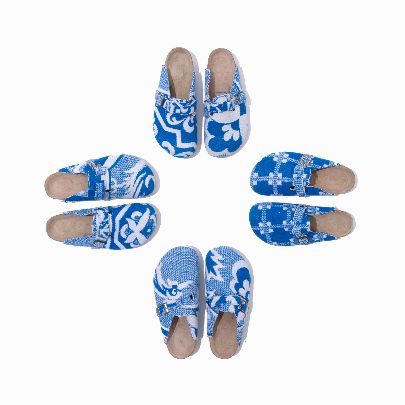 Picture of White and Blue patterned sandals with a closed front