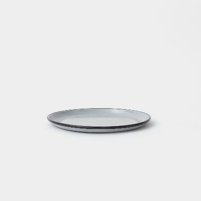 Picture of medium dolphin plate with black rim