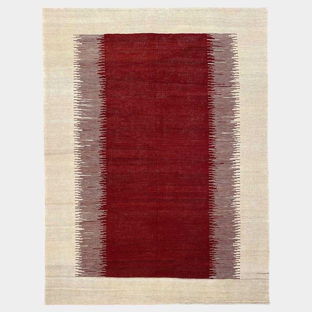 Picture of red and white wool rug tohi