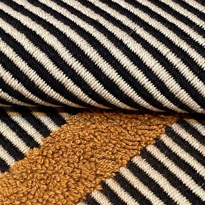 Picture of Black, white, and orange wool Tanas carpet