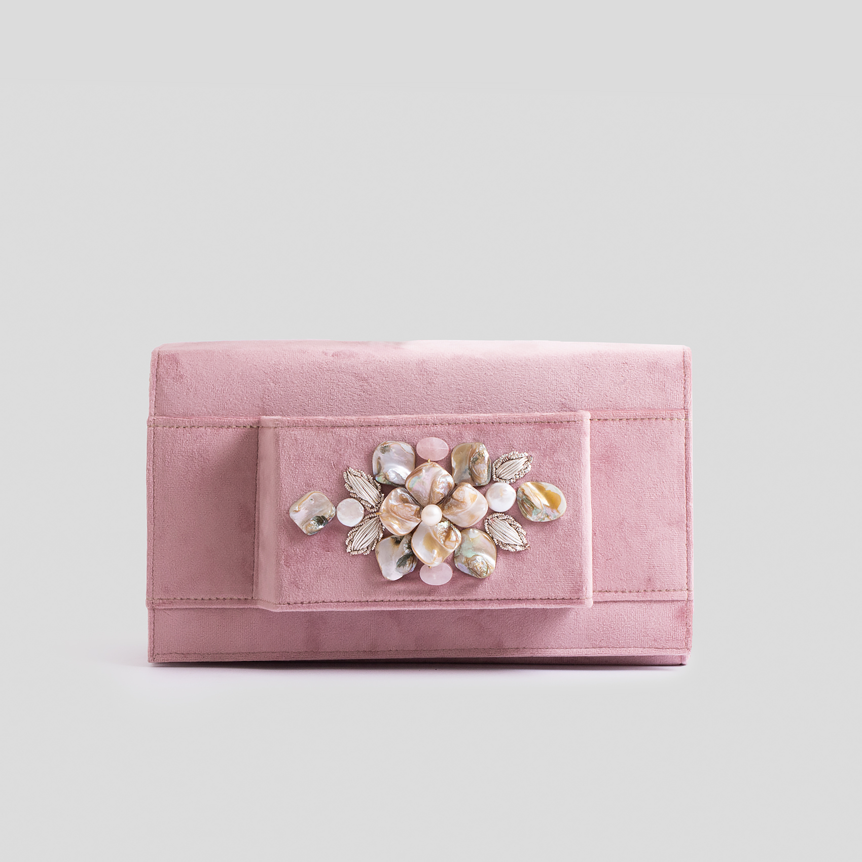 pink velvet clutch bag