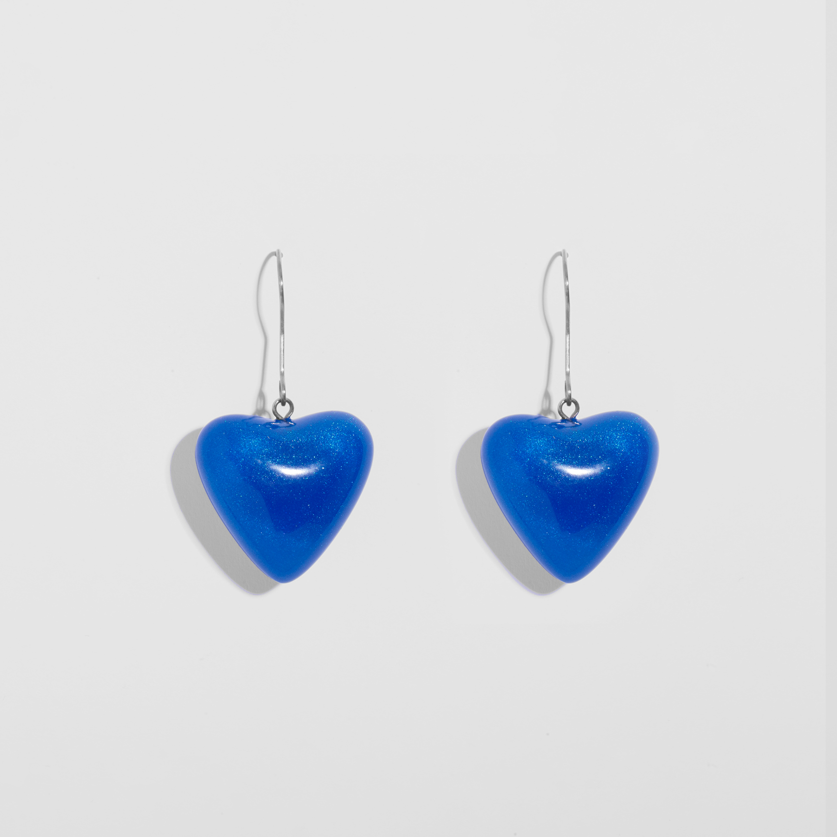 Picture of Blue ghalb resin and steel earrings