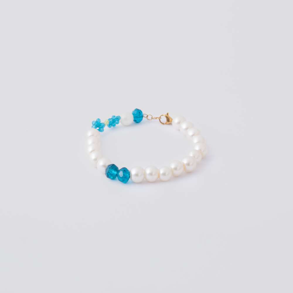 Picture of  Pearl and blue flower bracelets