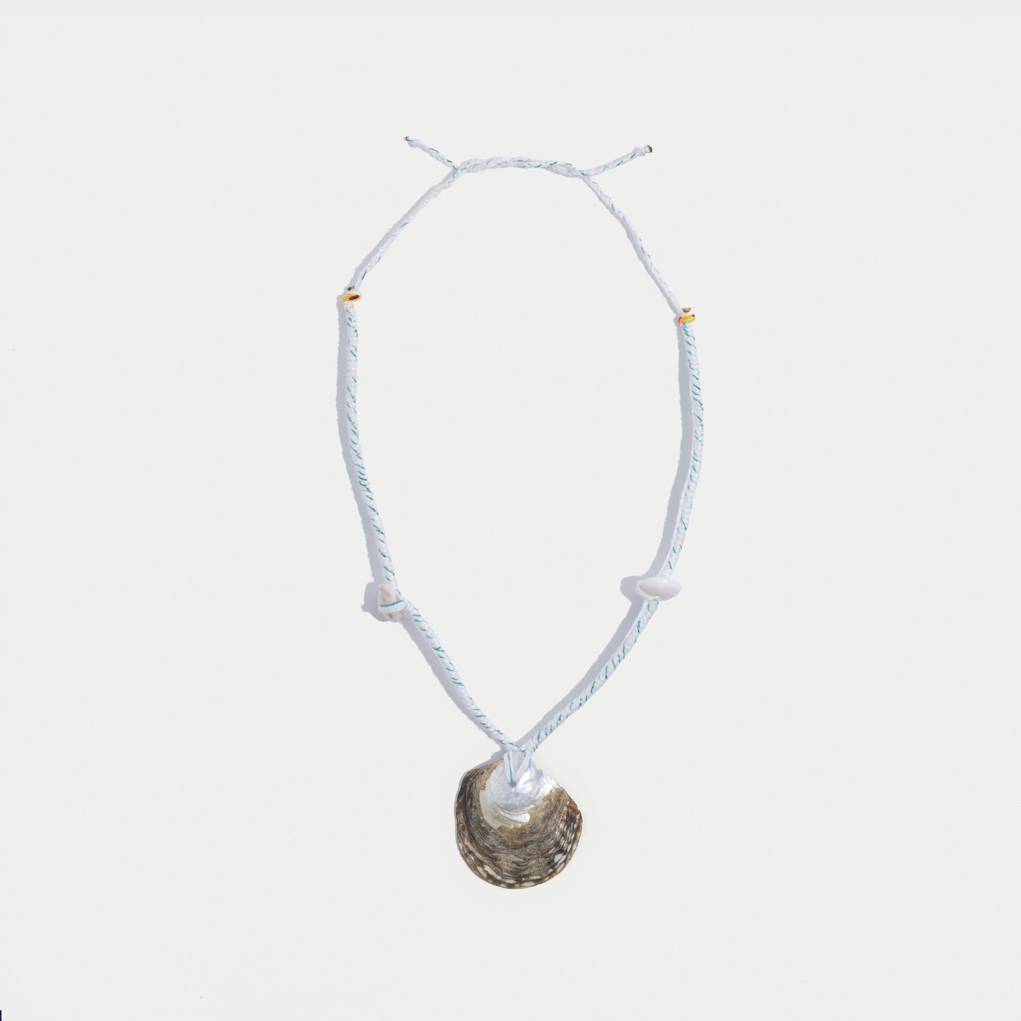 Picture of necklace of thread and shell