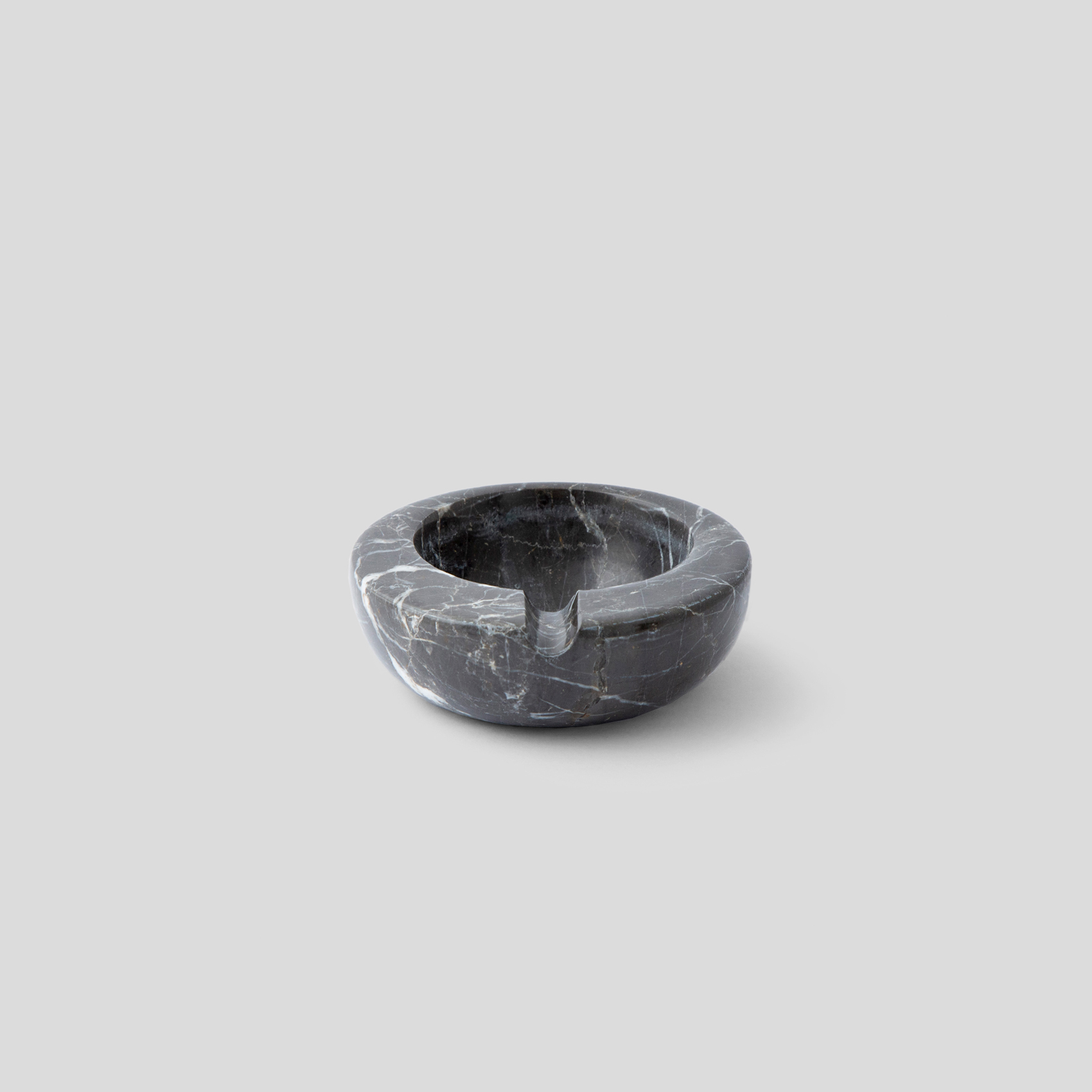 Picture of Irregular Black round ashtray