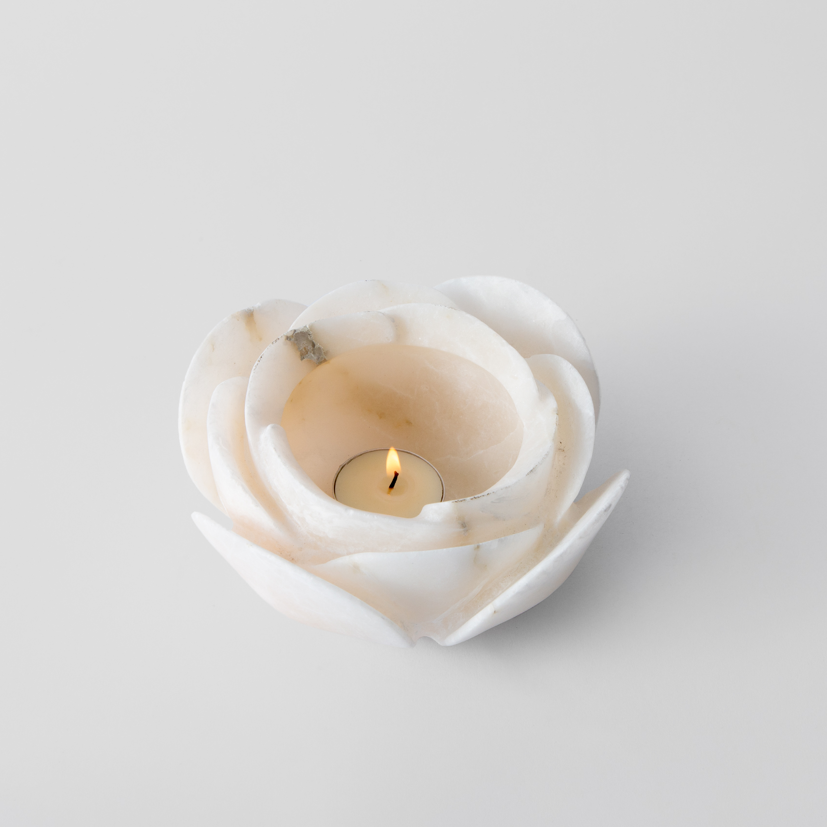 Picture of alabaster candle stick flower design