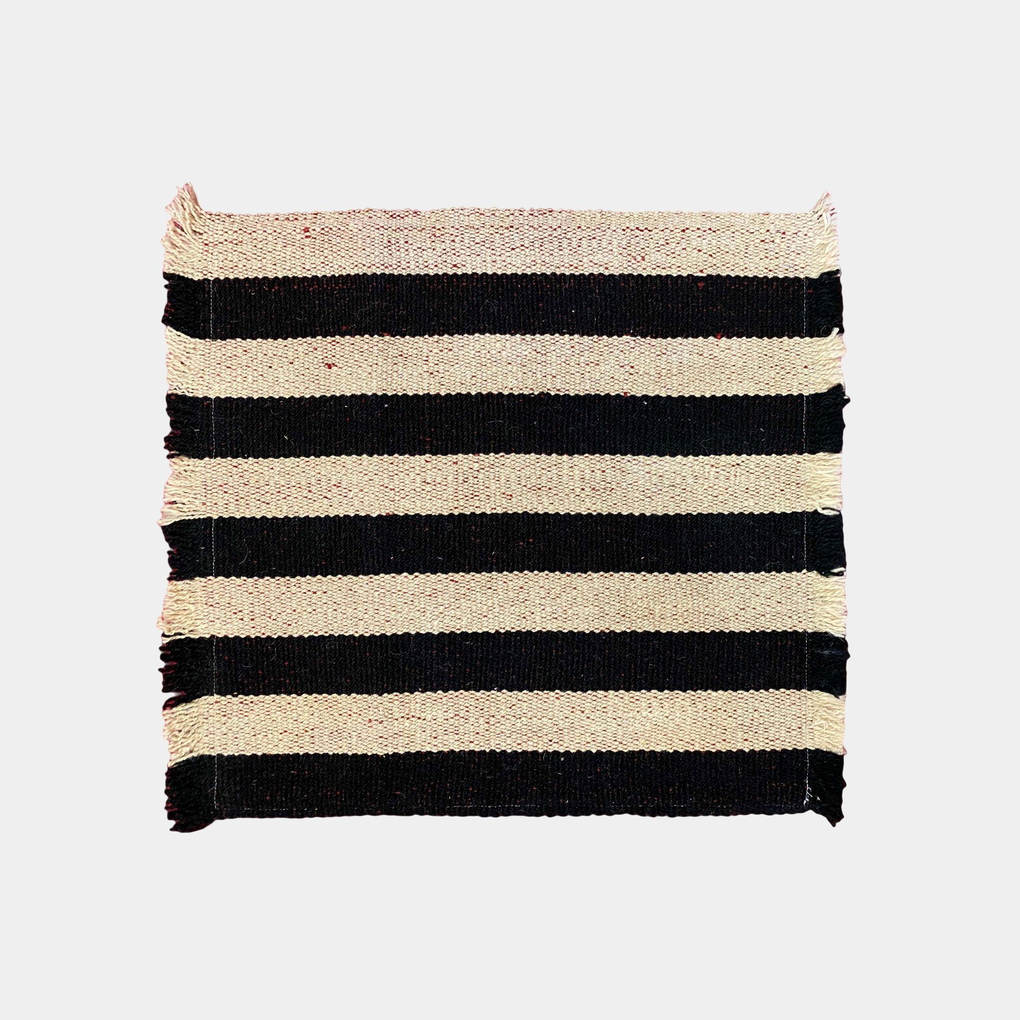 Picture of Natural black and white wool cushion rug